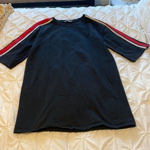 Black, heavyweight t-shirt dress with red/white stripes on the sleeves.